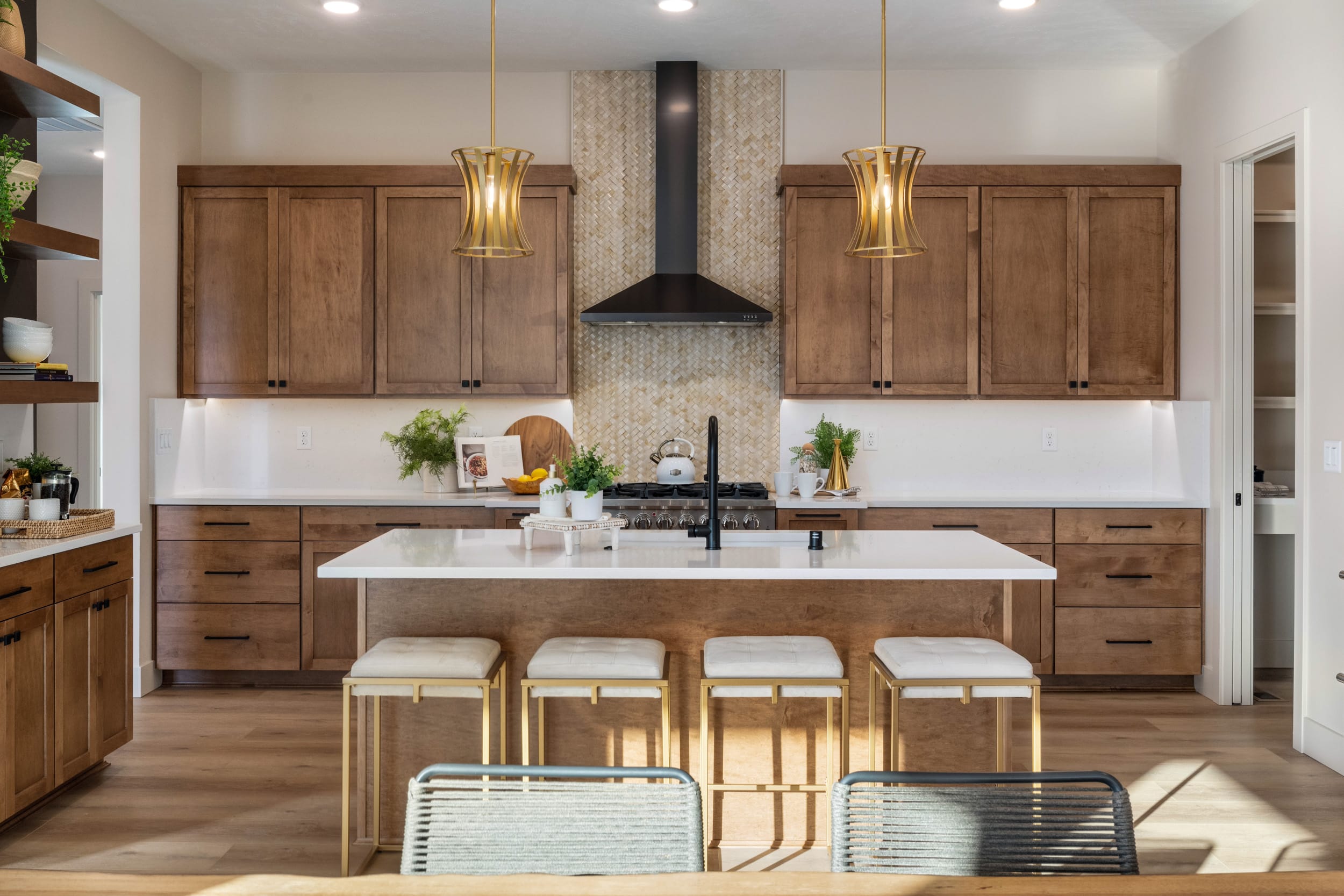 Modern kitchen with wooden cabinets and island.
