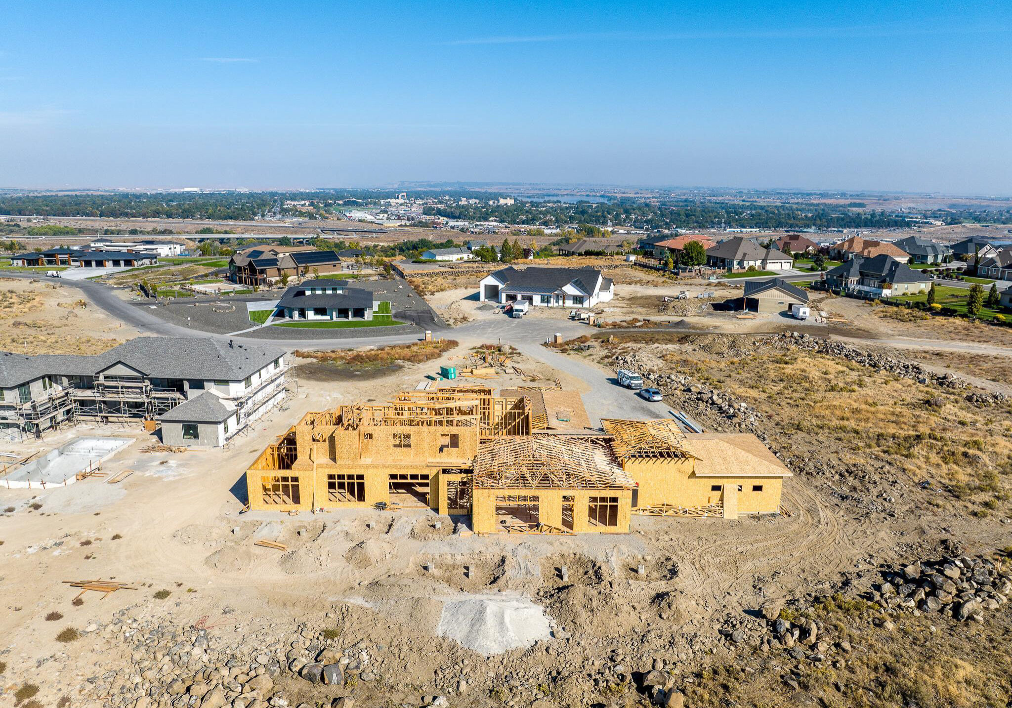 Aerial view of suburban home under construction.